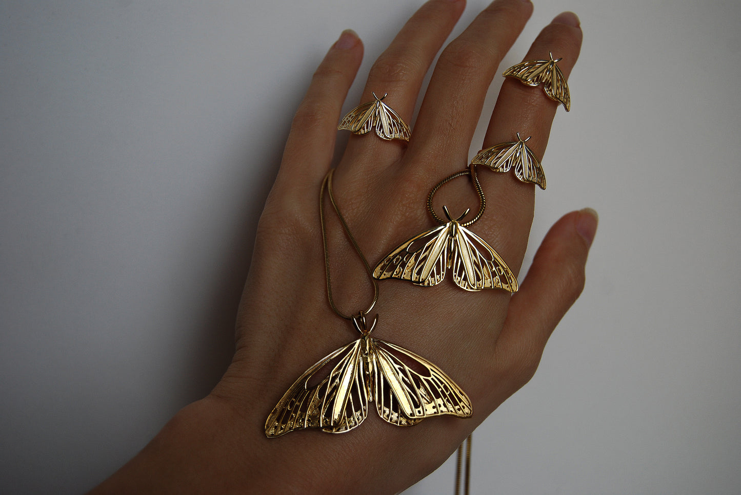 14k gold Monarch Butterfly rings and pendant worn on hand, showcasing elegant Art Nouveau design