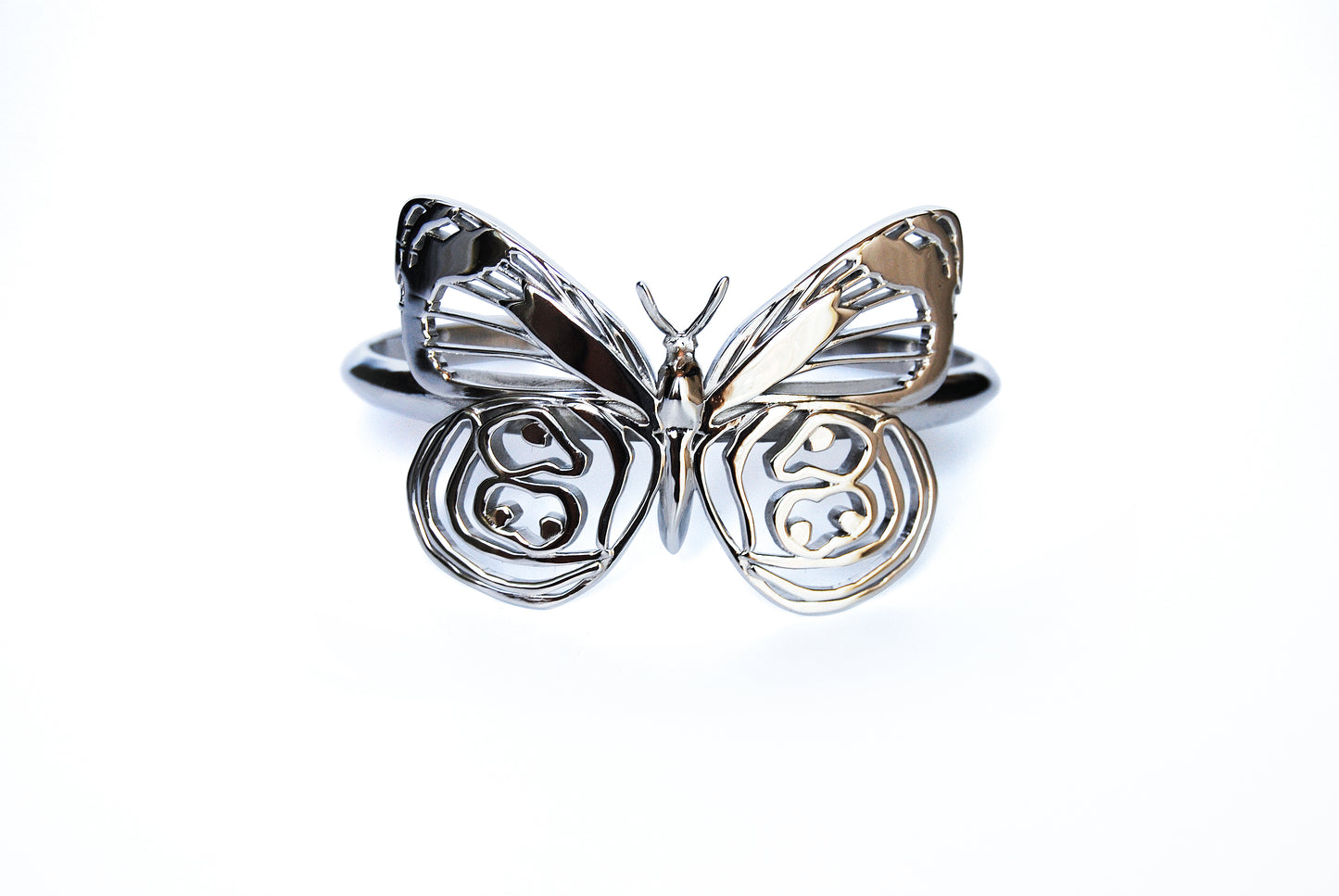 Front view of silver Eighty-eight Butterfly Bracelet on white background, showcasing wing symmetry and texture.