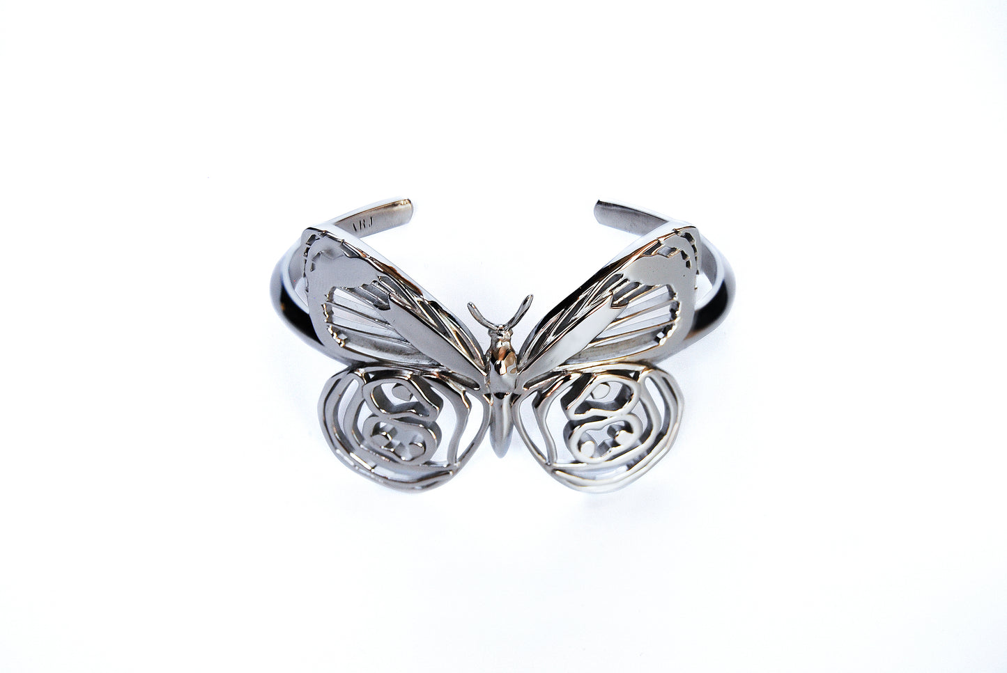 Top view of silver Eighty-eight Butterfly Bracelet on white background, highlighting wing layout and proportions.