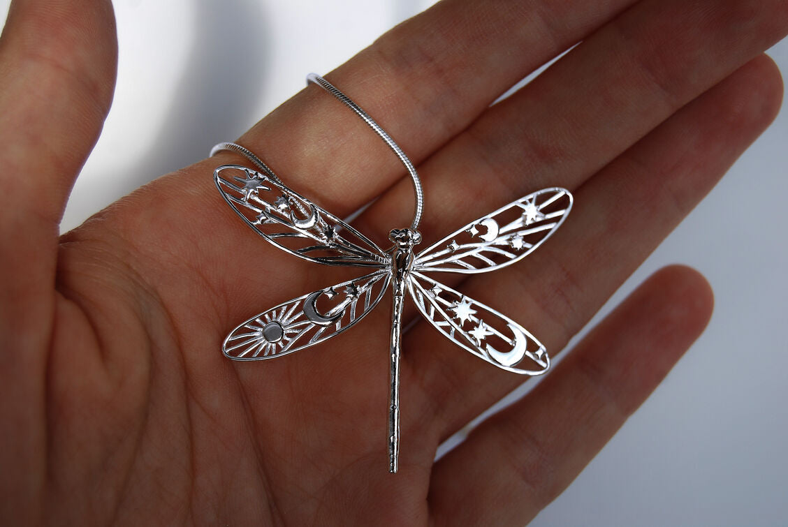 Sterling silver celestial damselfly pendant with hidden loop design