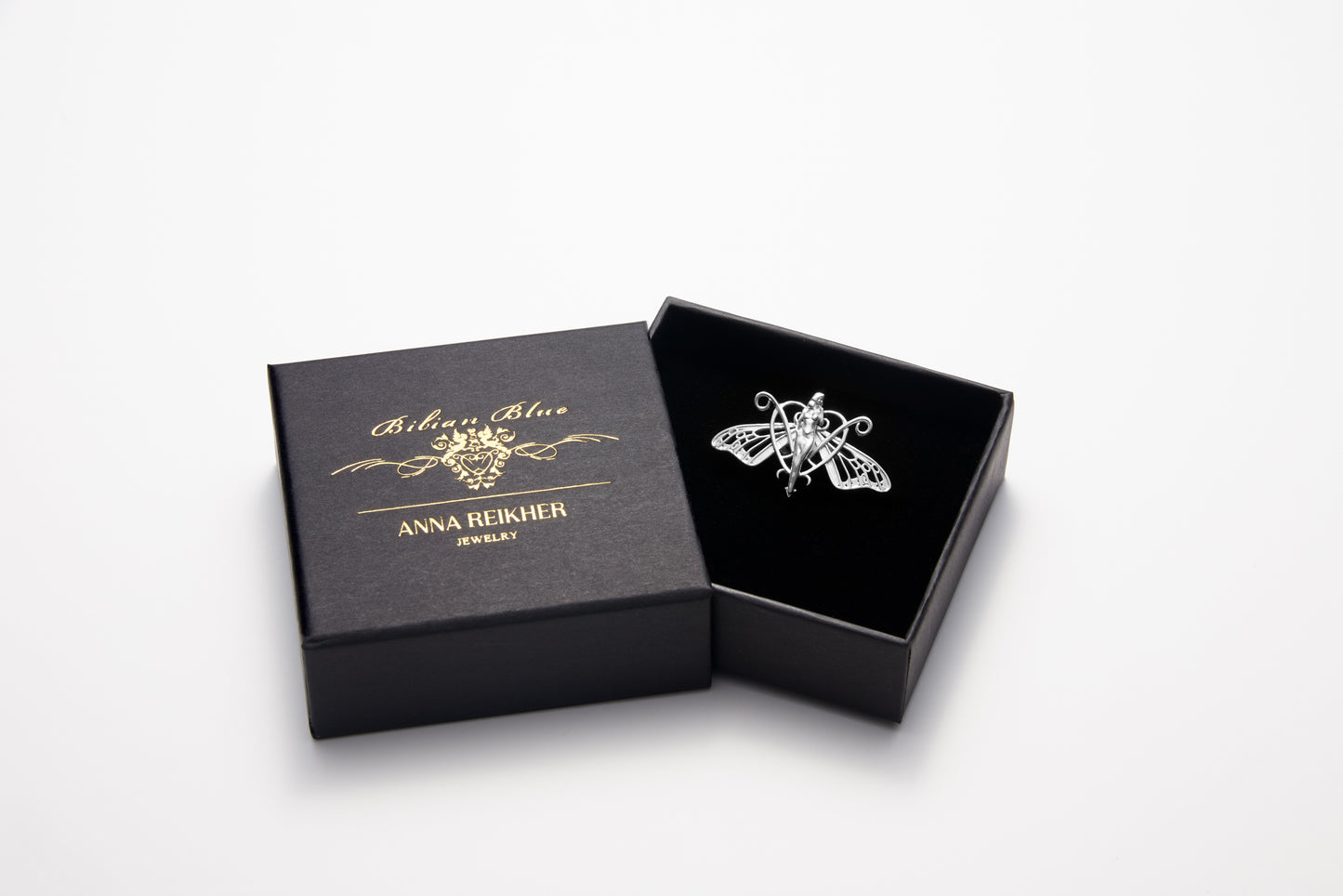 Display of handmade butterfly nymph earrings with vintage-inspired styling