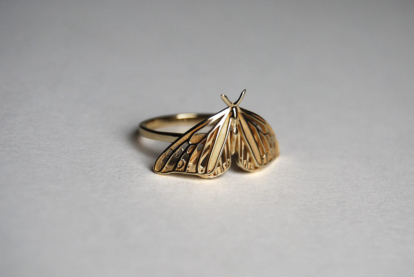 Side view of gold Monarch Butterfly ring showcasing Art Nouveau inspired design