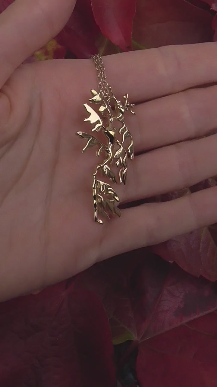 Video of 14K gold plated Leafy Sea Dragon Pendant, highlighting handcrafted ocean jewelry.