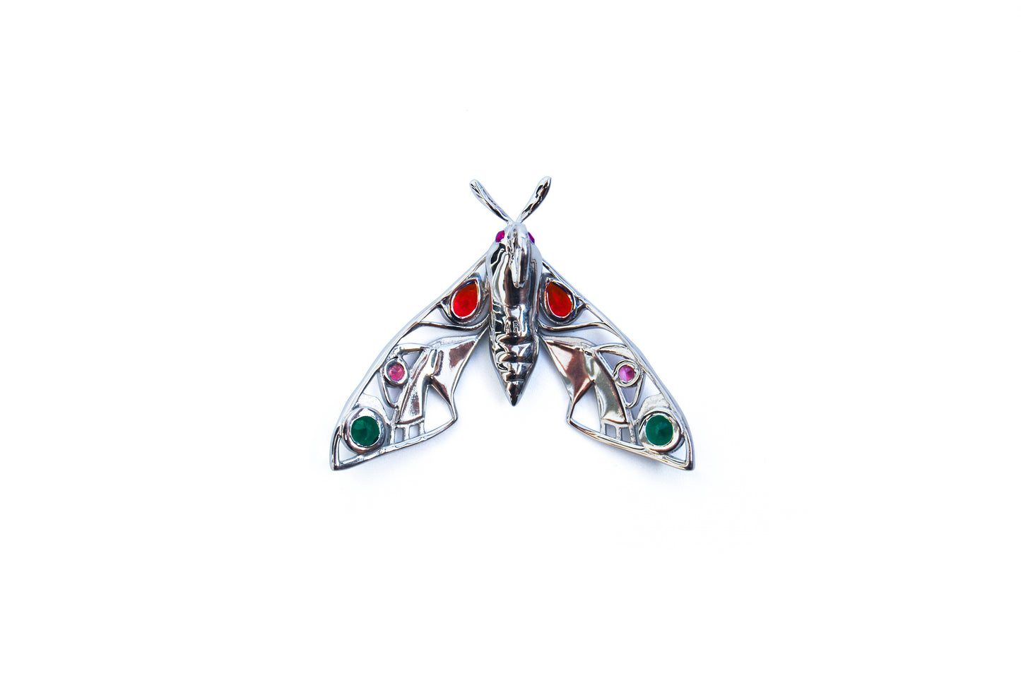 Back view of silver moth pendant necklace on white background