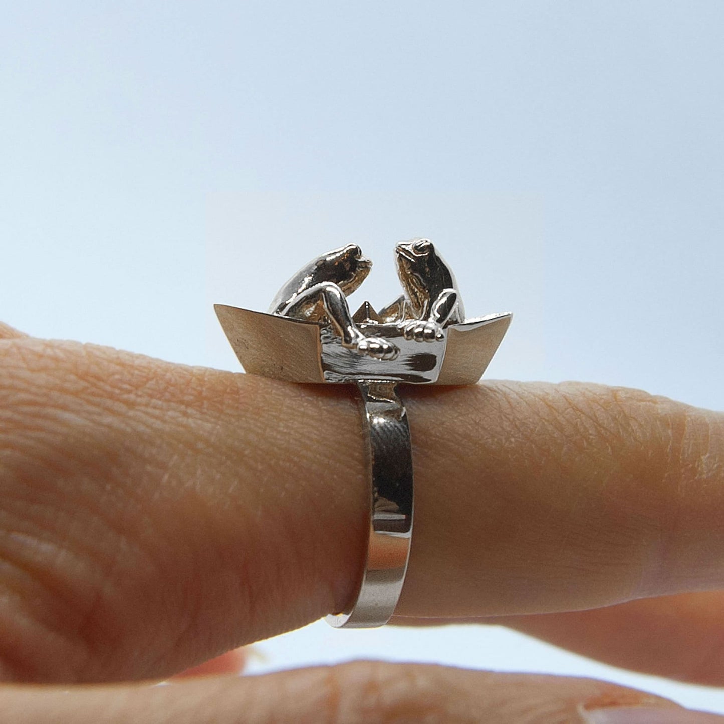 Frogs in origami boat ring