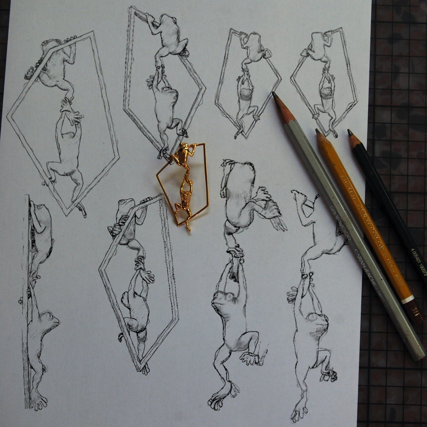 Geometric frog hoop earrings