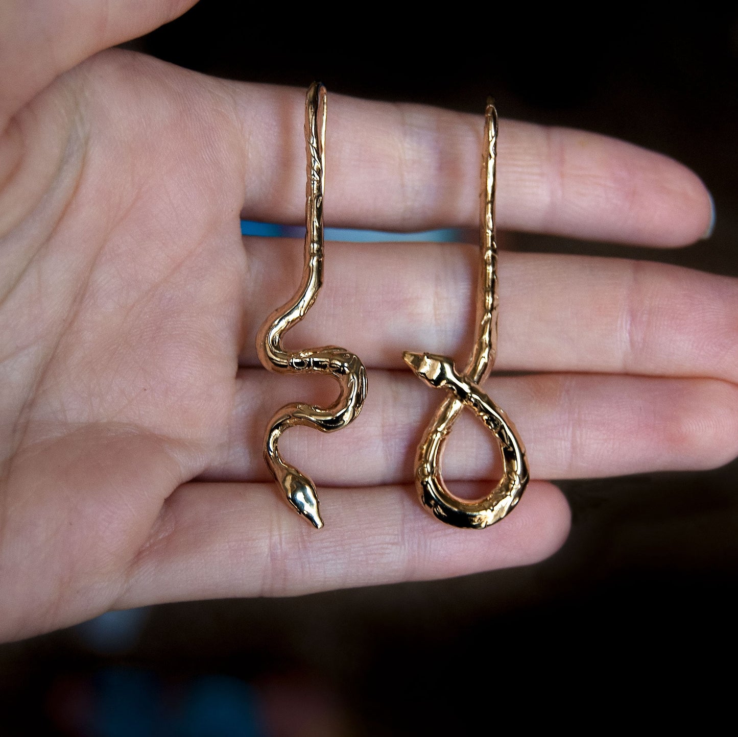 Asymmetrical snake drop earrings