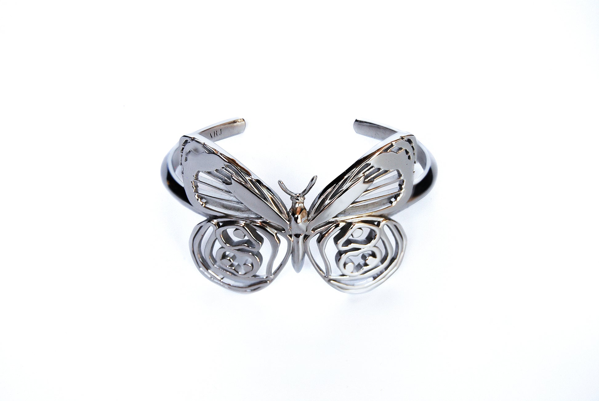 Top view of silver Eighty-eight Butterfly Bracelet on white background, highlighting wing layout and proportions.