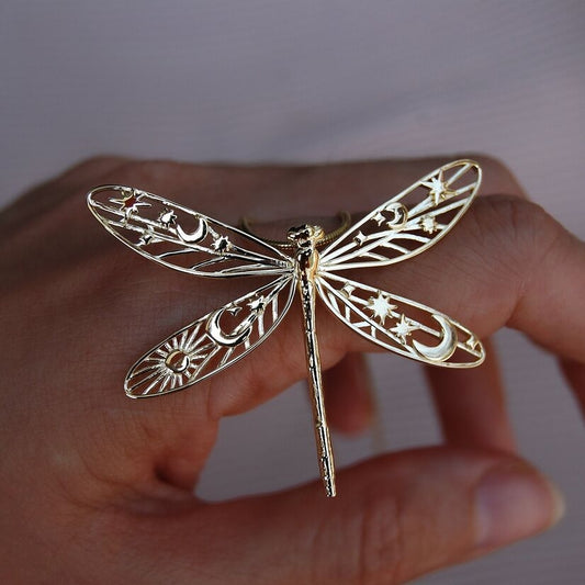 Front view of celestial damselfly pendant in 14k gold-plated brass