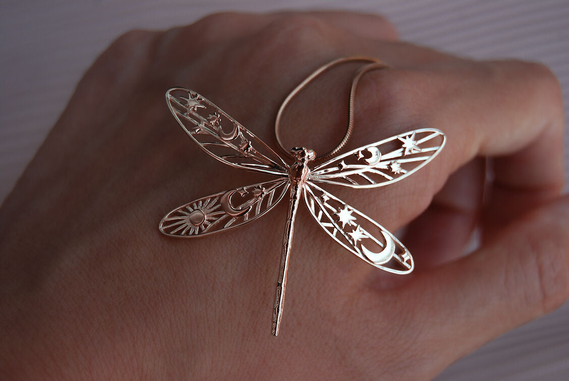 elestial damselfly pendant in 14k rose gold-plated brass on white background