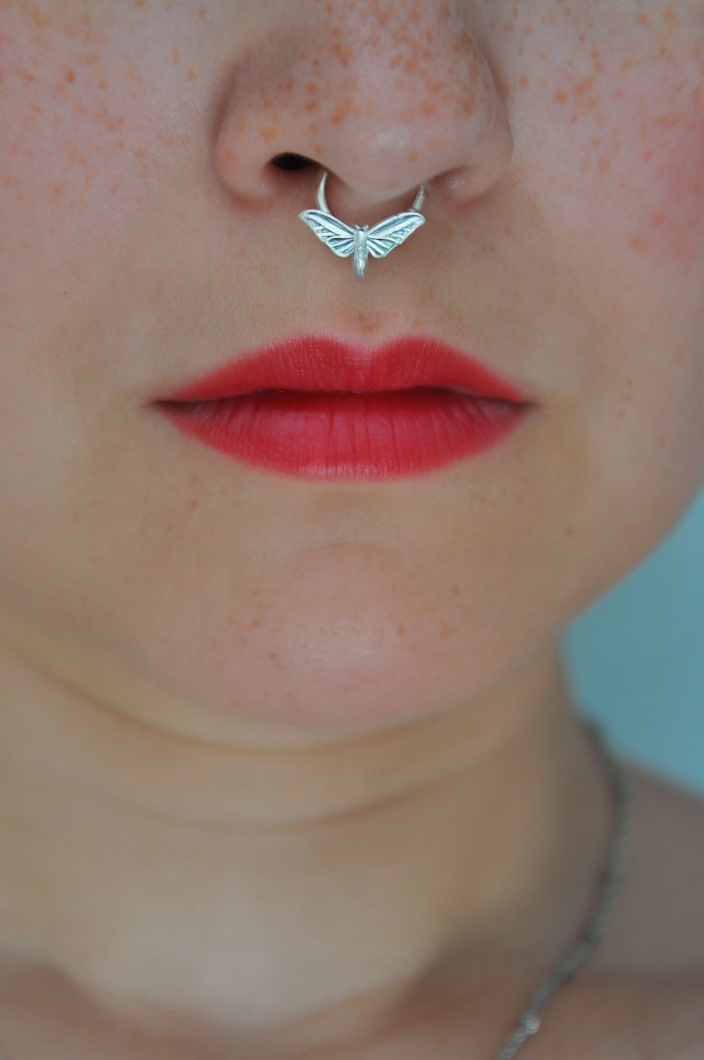 Celestial hawk moth septum ring, handcrafted silver insect jewelry with unique moth motif

