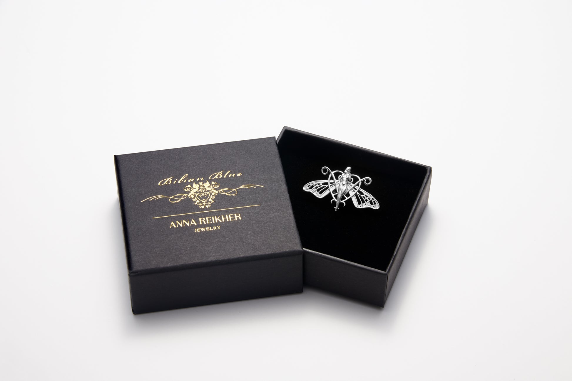 Display of handmade butterfly nymph earrings with vintage-inspired styling