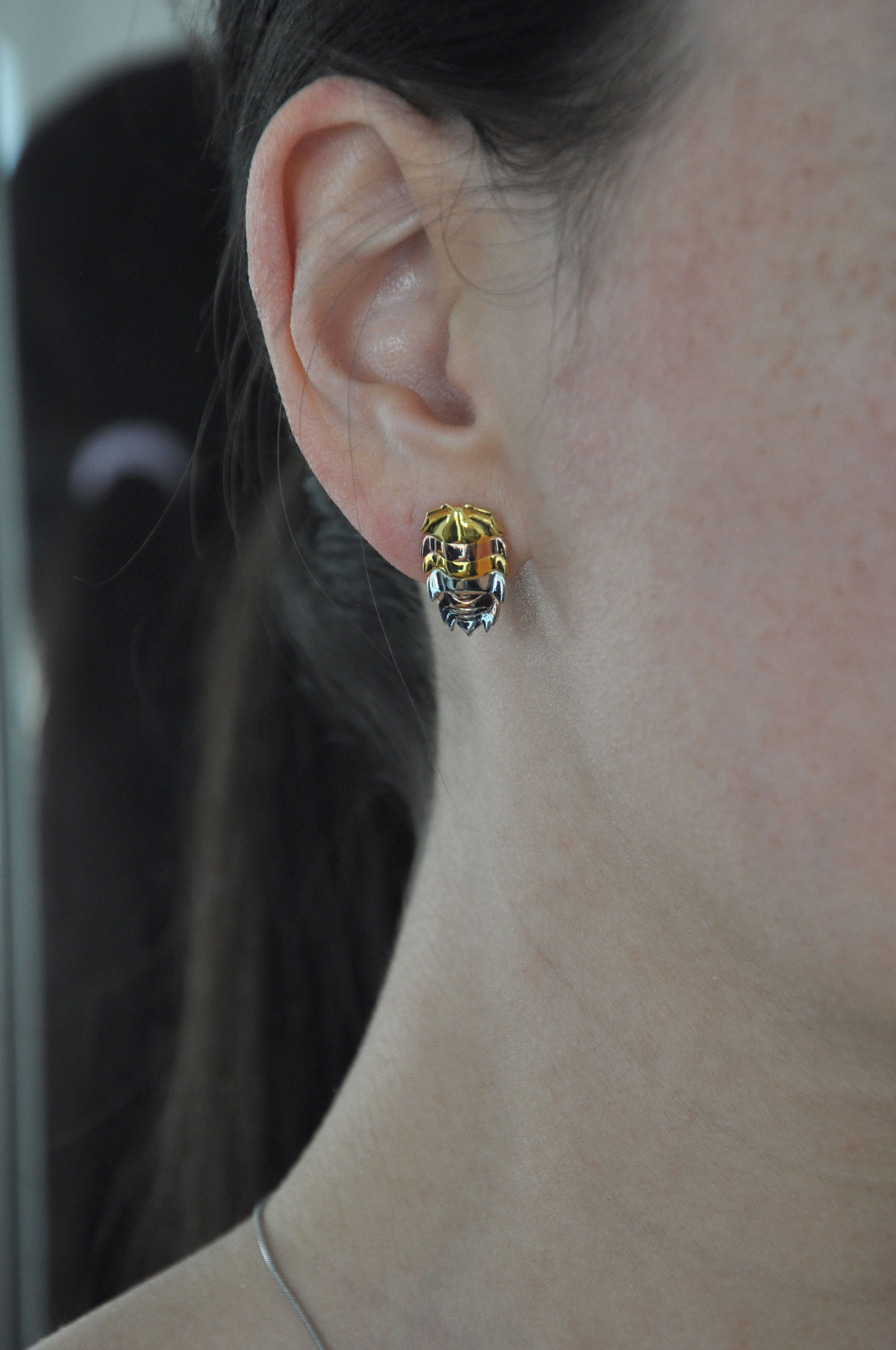 Stylish rainbow isopod earrings featuring a mixed metal design, merging sterling silver and 14k gold plated elements for a nature-inspired look