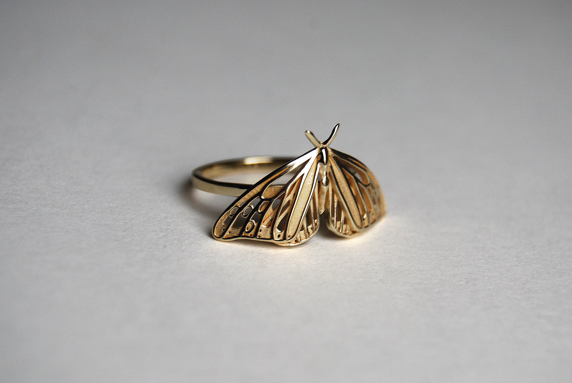 Side view of gold Monarch Butterfly ring showcasing Art Nouveau inspired design