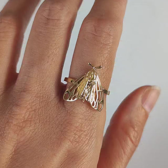 Video showing Tiger Moth Ring in 14K gold plated finish worn on hand, highlighting insect-inspired jewelry.