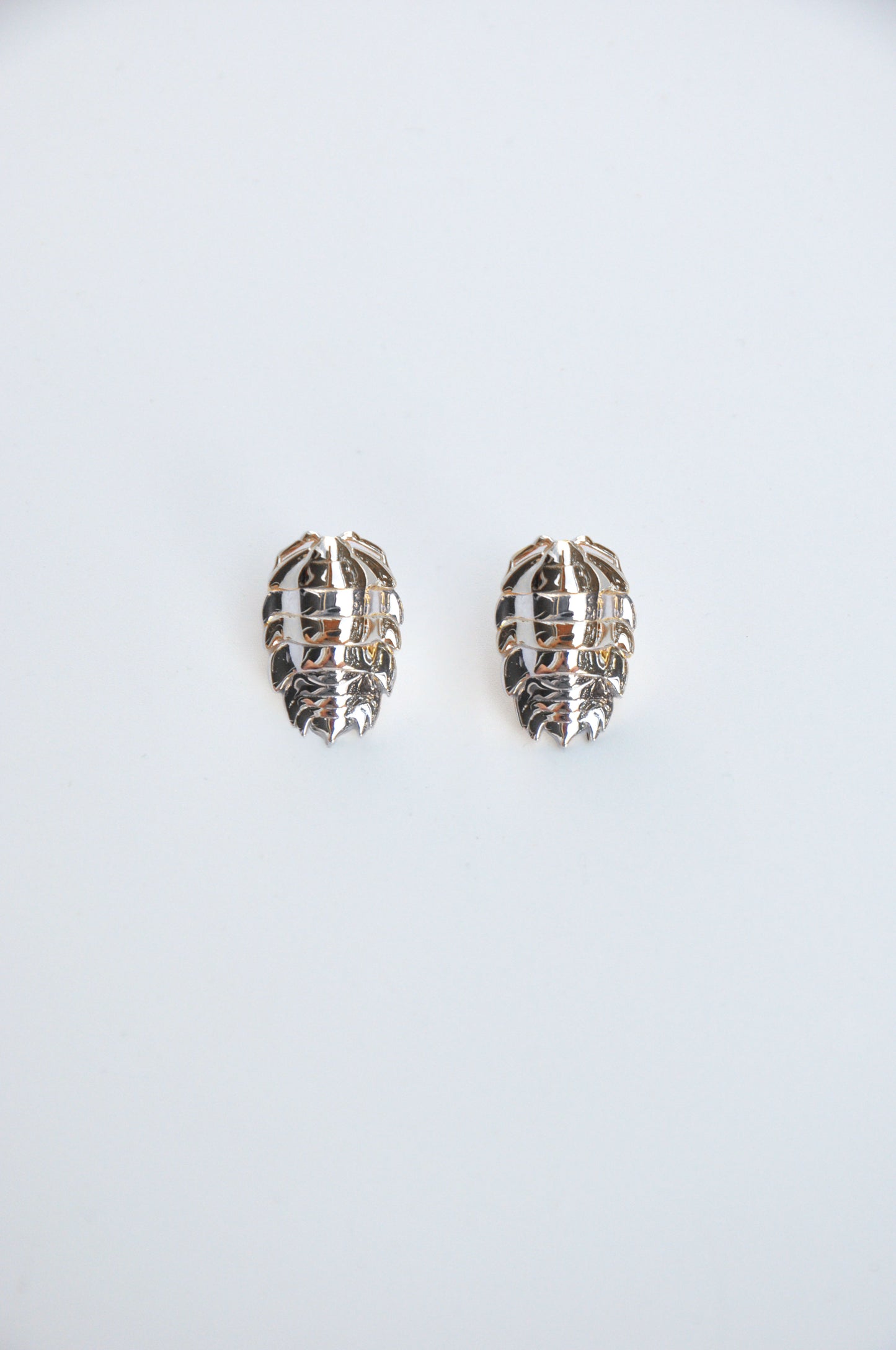 Elegant sterling silver rainbow isopod earrings, perfect for insect ring and bug jewelry enthusiasts