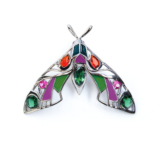 Front view of silver moth pendant necklace on white background