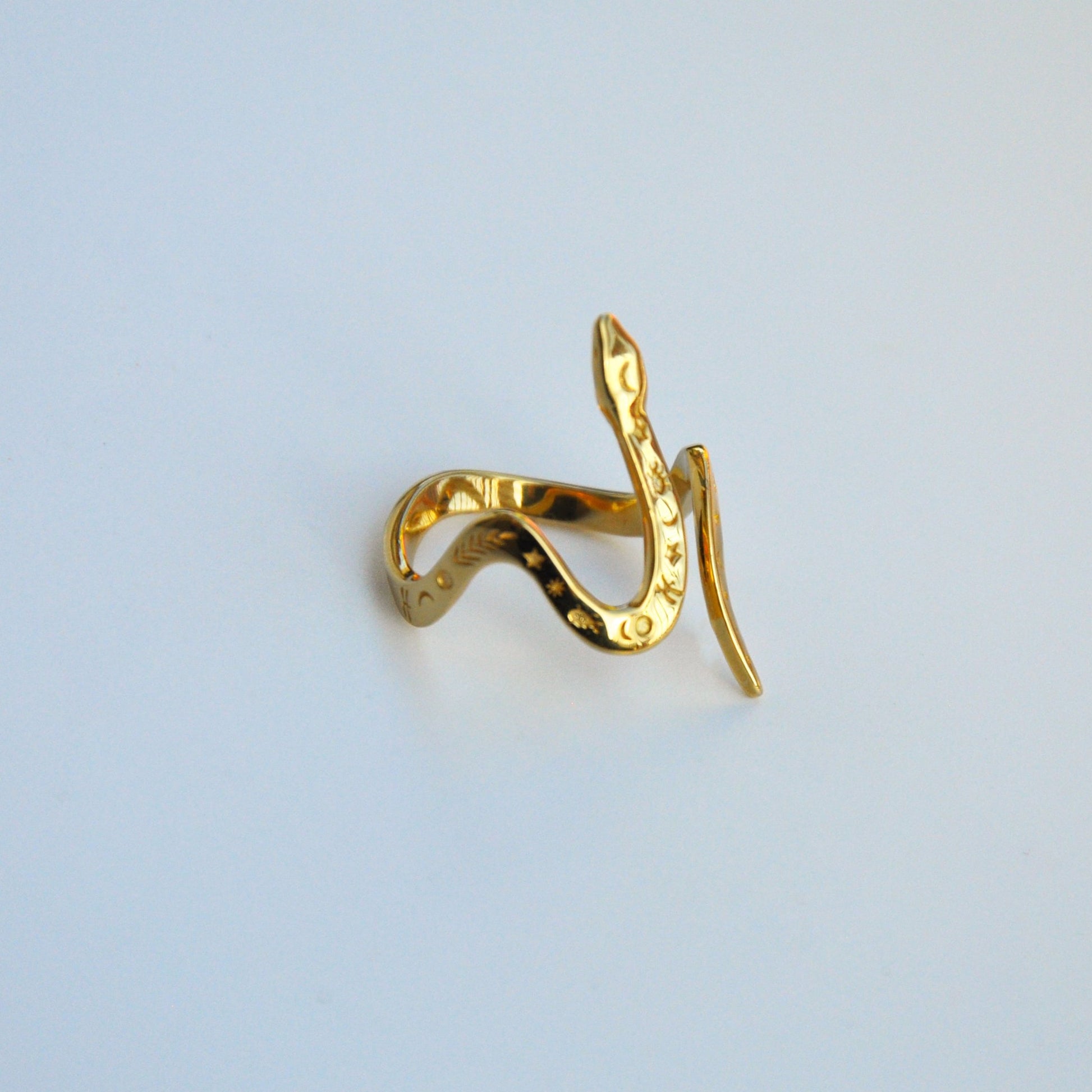 Celestial snake ring in 14K gold plated finish, displayed horizontally on white background.