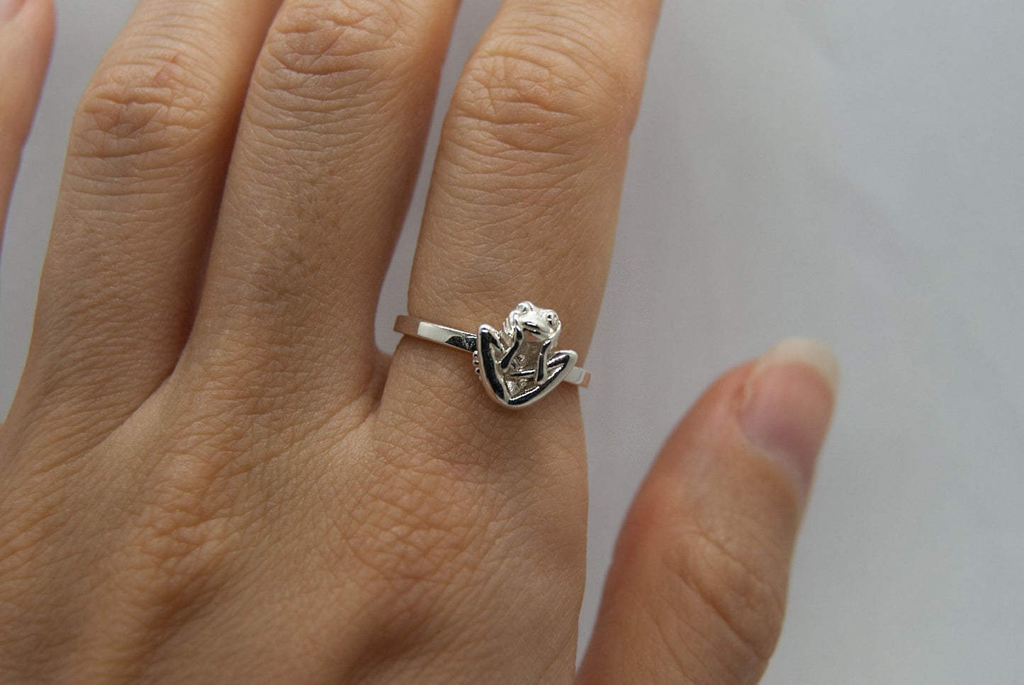 Tiny frog in Embryo pose ring