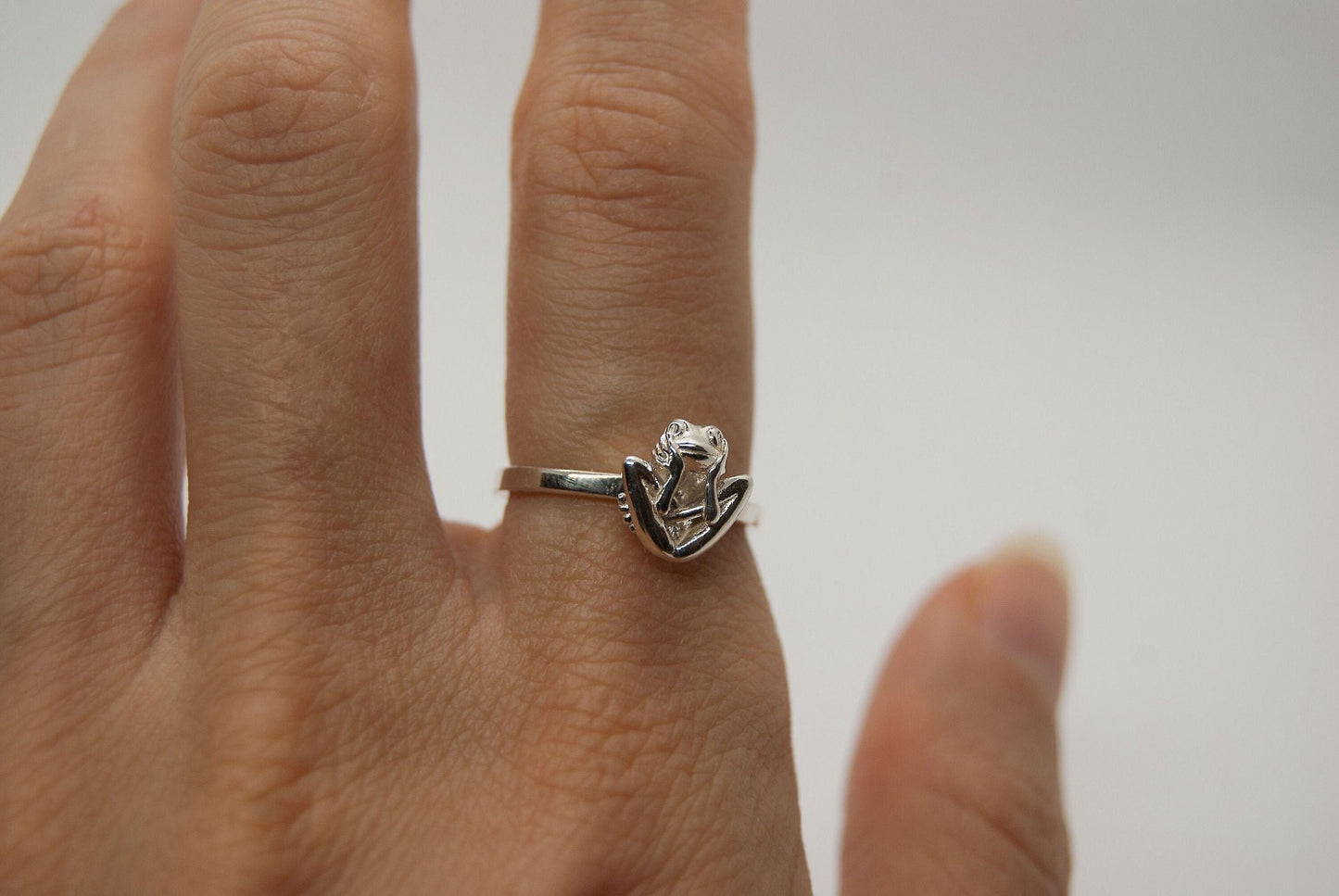 Tiny frog in Embryo pose ring