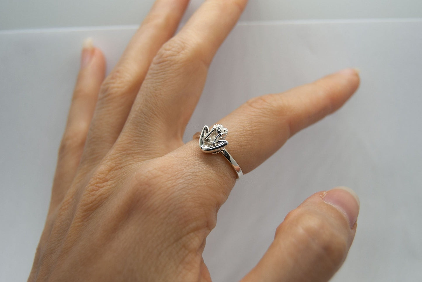 Tiny frog in Embryo pose ring